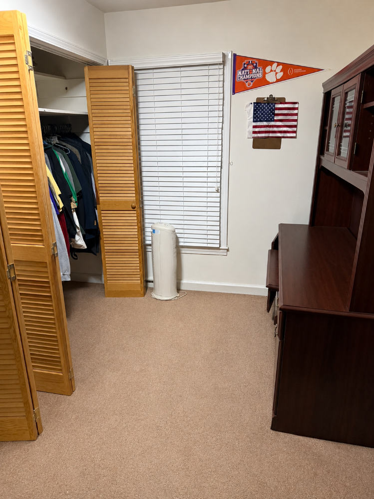 The same room completely cleared and swept clean after junk removal